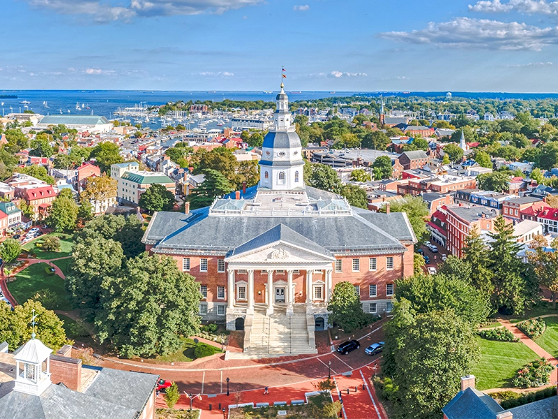 Sky line view of an eastern coastal town with large building in the center