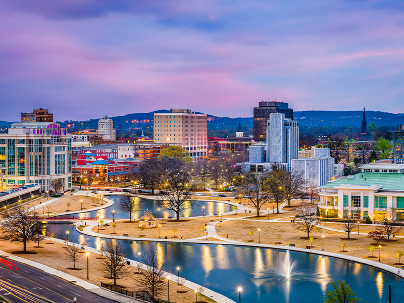 Photo of a city in Alabama at night time.